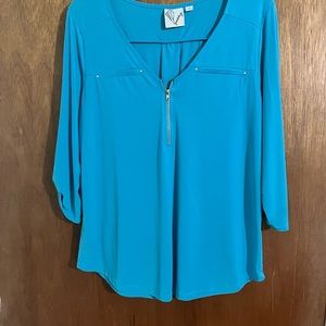 Top, v neck, sipper front, 3/4 sleeves, tab & button on sleeve